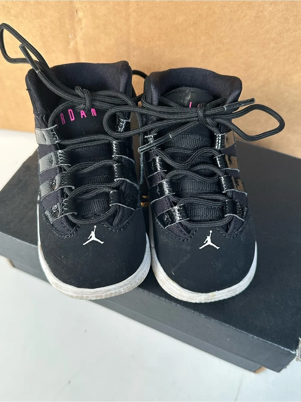 Jordan Kids Black and White High-Top Sneakers